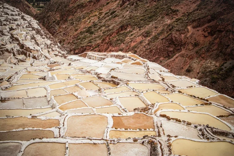 Panoramic view of the Maras Salt Mines with hundreds of traditional Salt Pools in the Sacred Valley visited during the ATV Maras Moray tour