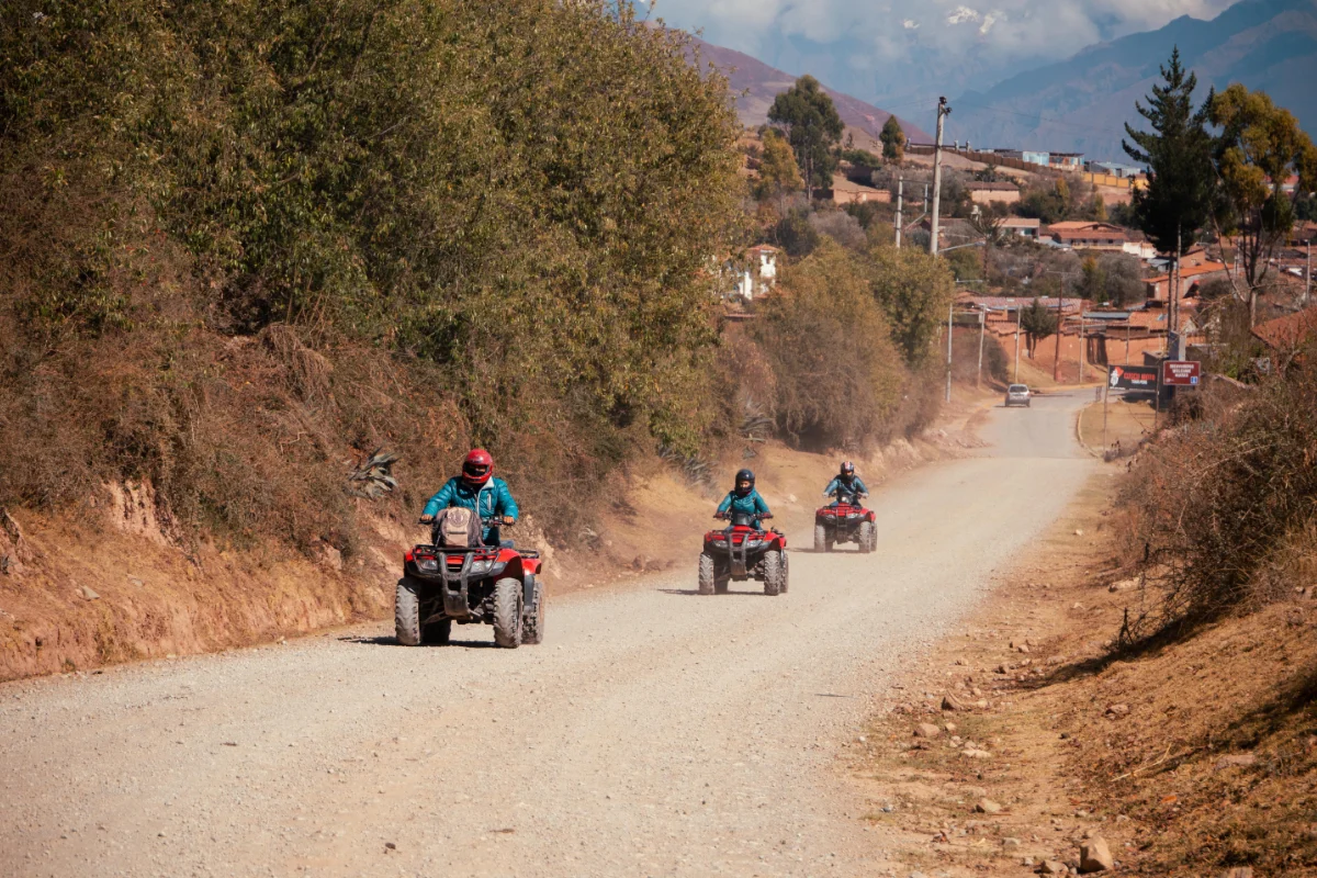ATV riders on a road to Maras and Moray