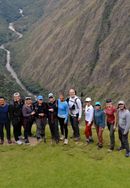 Hiking group in an Andean valley