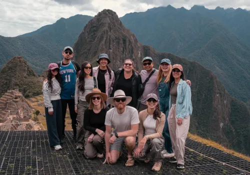Tour group at a Machu Picchu viewpoint
