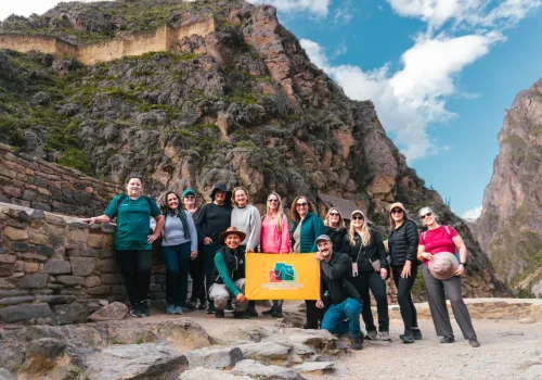 Tour group among the stone ruins of Ollantaytambo