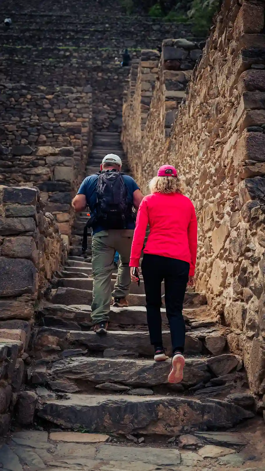 two tourists climbing stairs