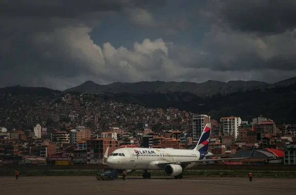 Main entrance of Cusco Airport Peru with passengers arriving