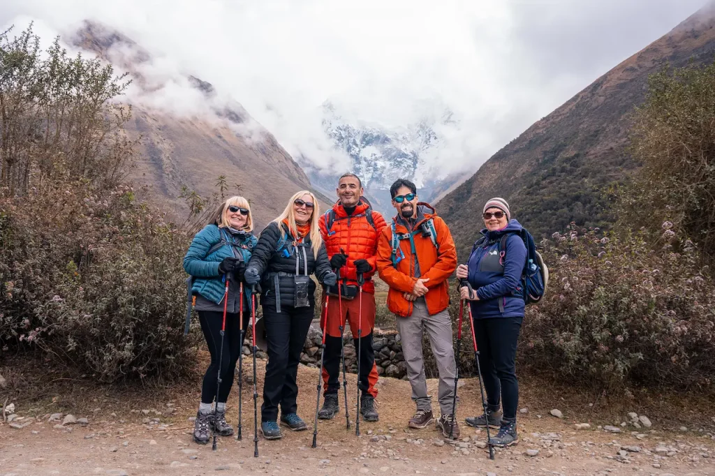 Guided hike to Humantay Lake surrounded by snow-capped peaks.