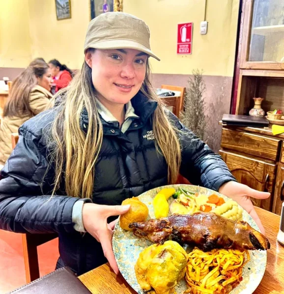 people eating Peruvian baked guinea pig